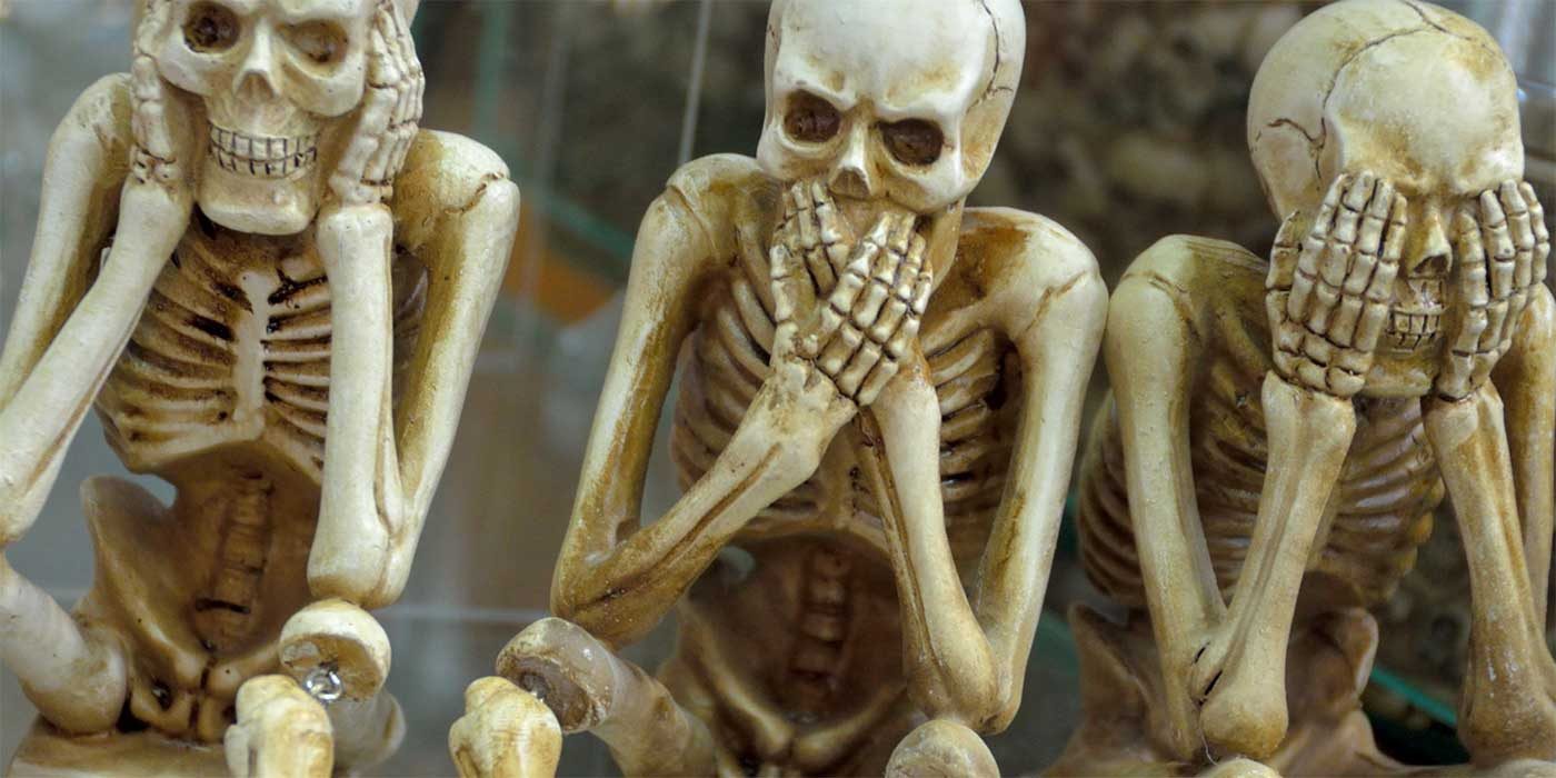 Photo of skeletons mimicking see , hear and speak no evil