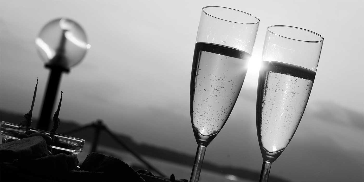 Photo of two champagne glasses