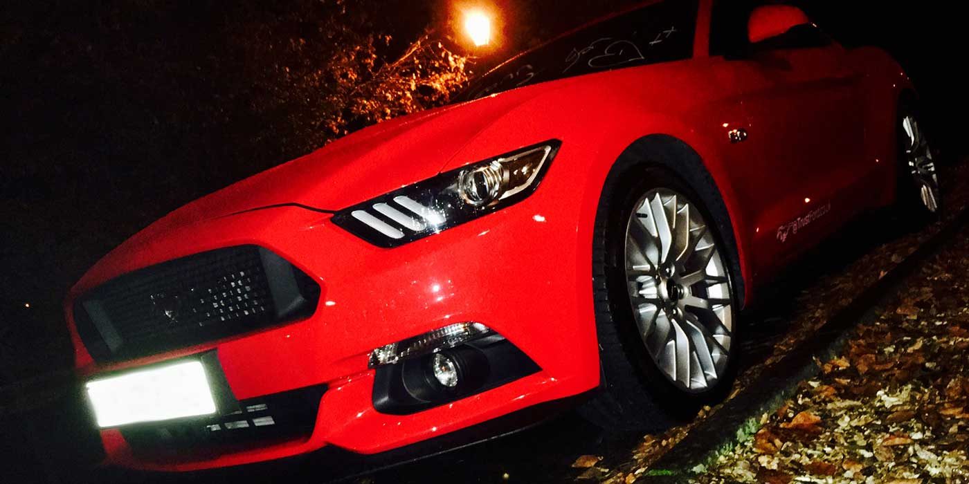 Photo of a red Ford Mustang