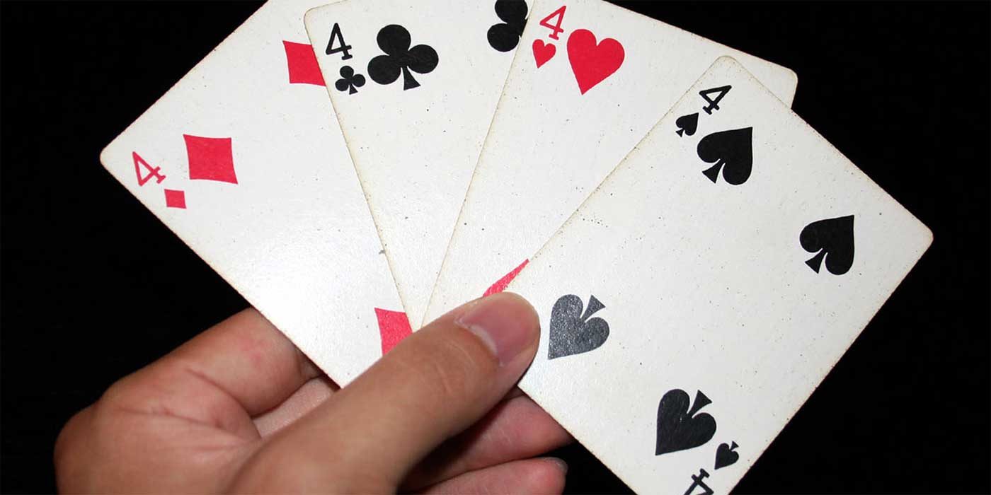 Photo of a hand of four cards