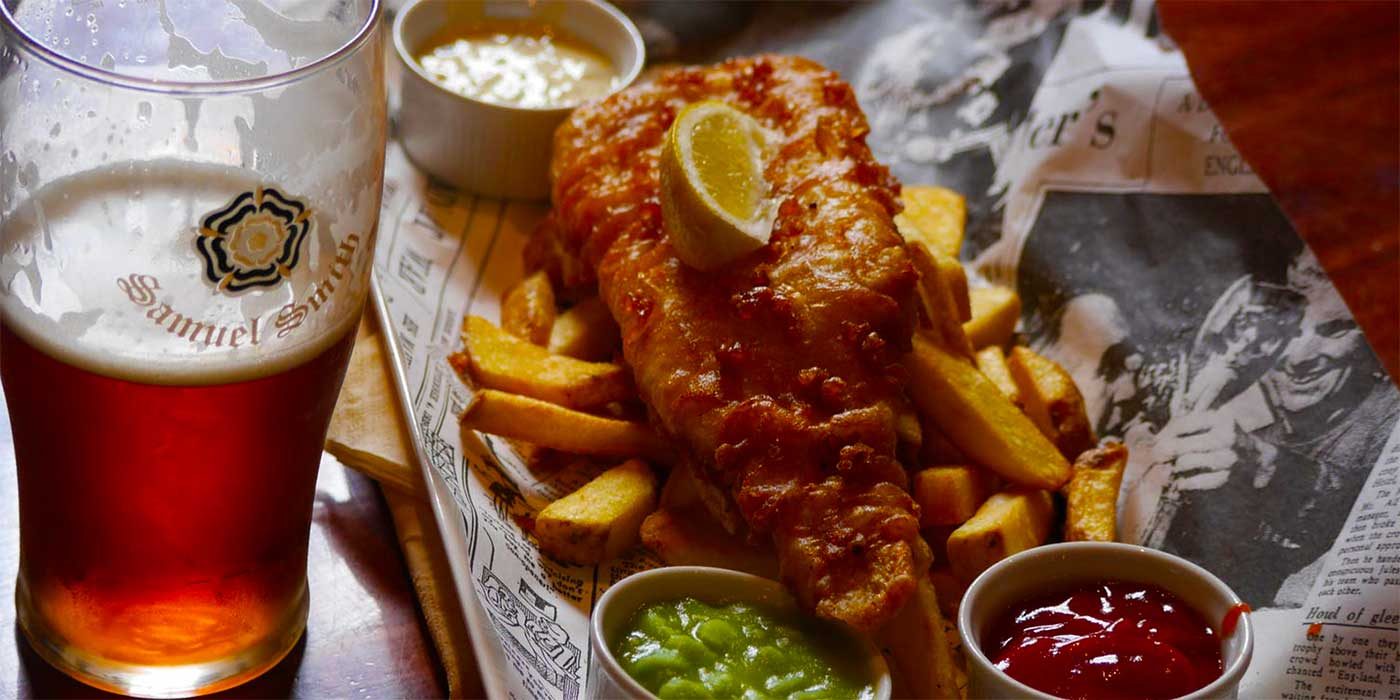 Photo of beer, fish and chips