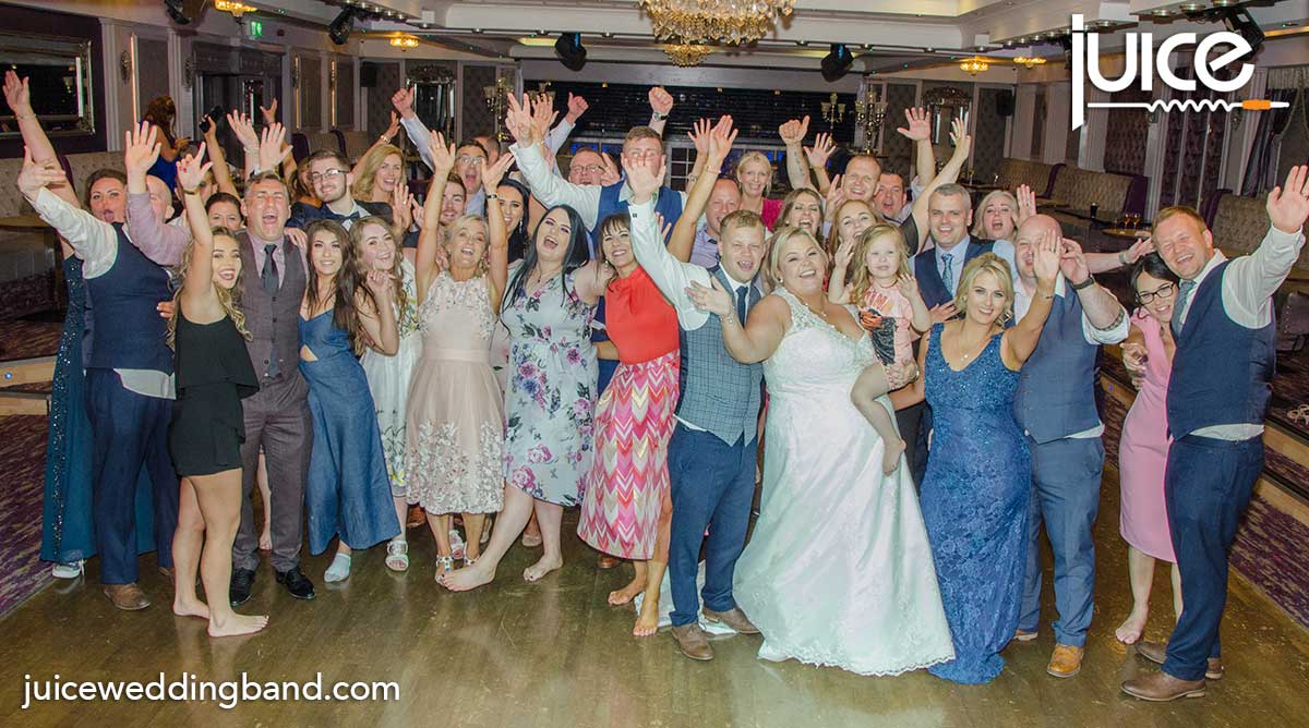 Photo of Helen, Neil and their wedding guests