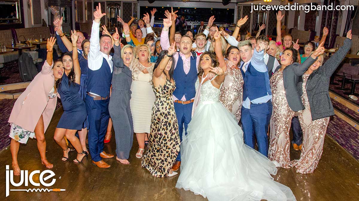 Photo of Danielle, Lee and their wedding guests