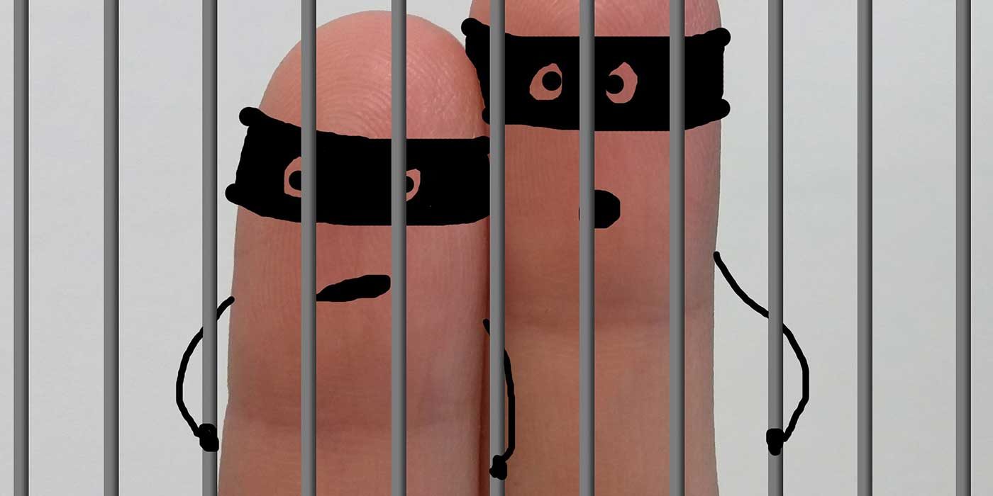 Photo of two fingers with robber masks