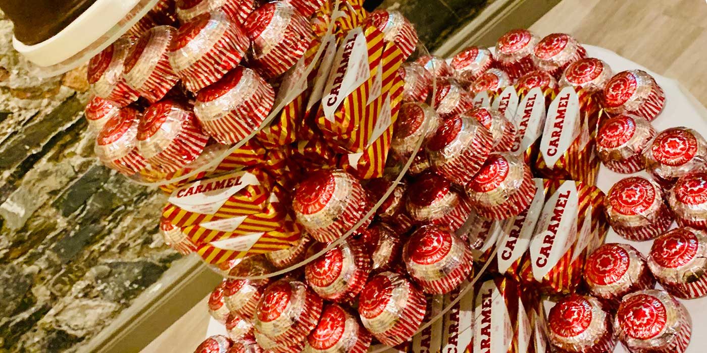 Photo of a wedding cake made from Tunnock's caramel wafers and teacakes