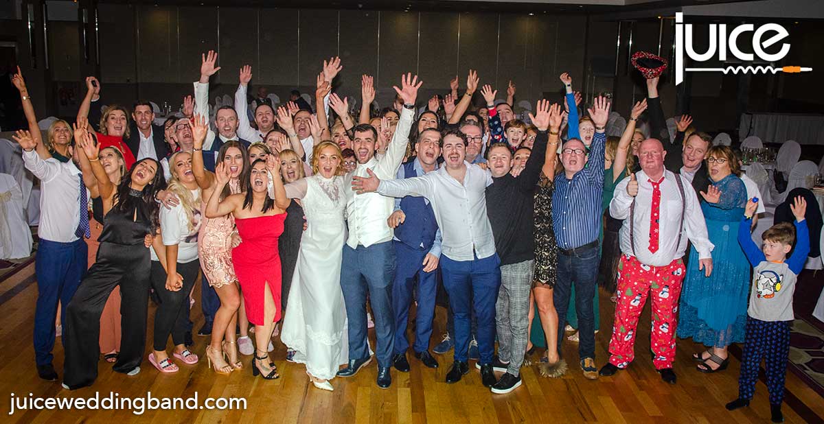 Photo of Lindsey, Wayne and their wedding guests