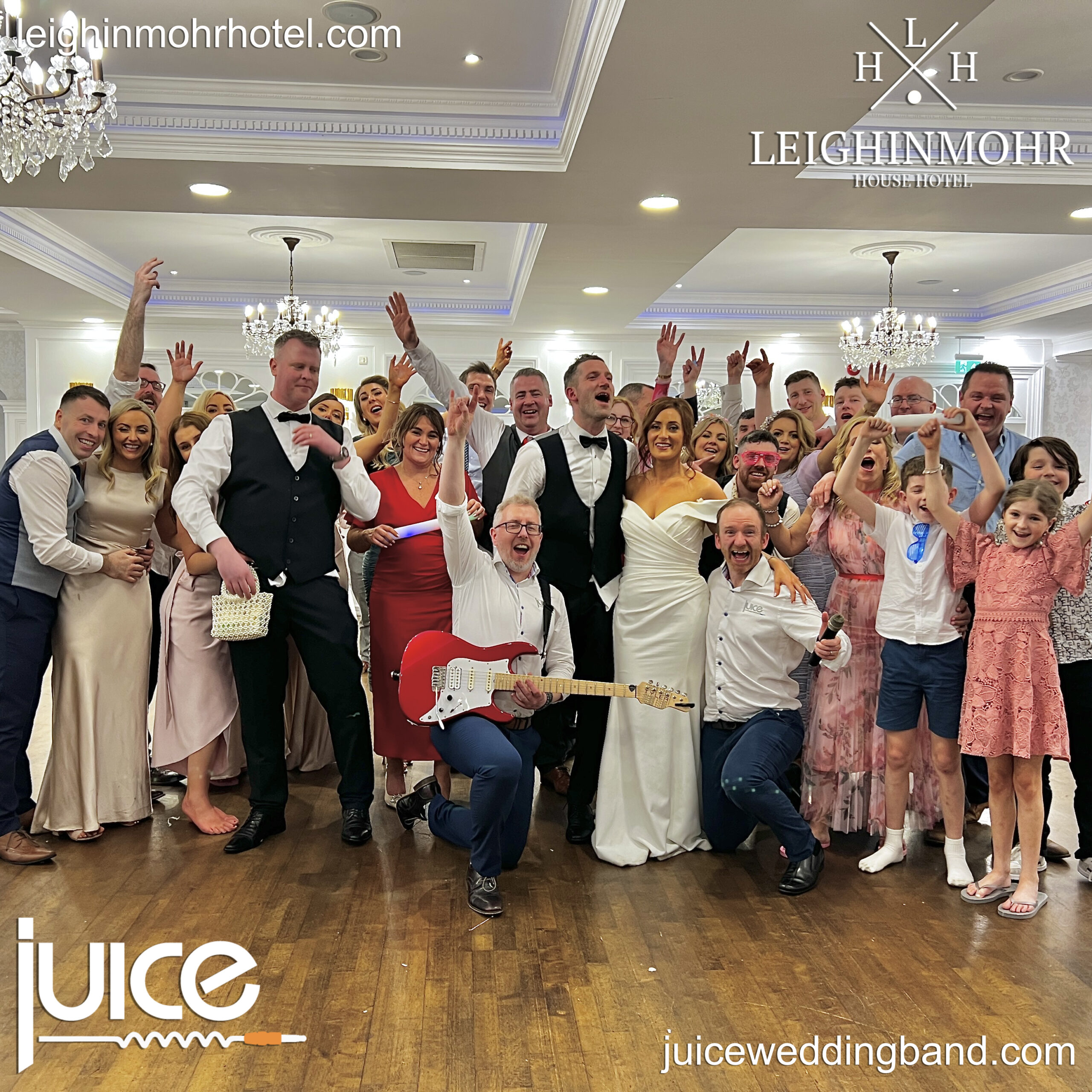 Photo of Shauna and Sean's wedding guests with Rod and Neil from Juice Wedding Band Northern Ireland